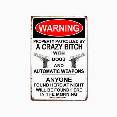 Patrolled by crazy bitch with dogs and automatic weapons metal warning sign
