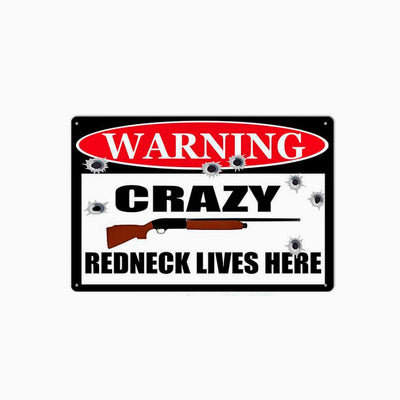 Warning crazy redneck lives here metal sign